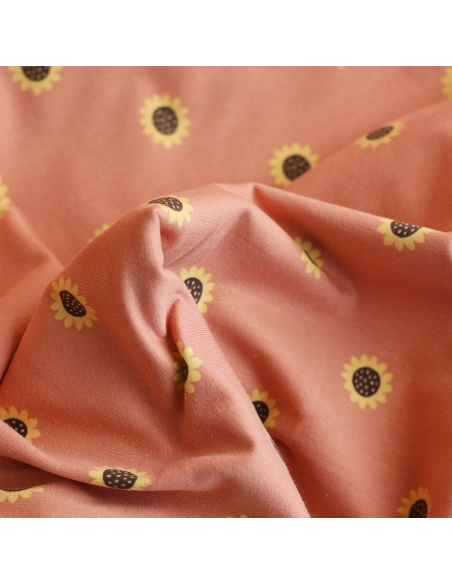 Jersey coton à motif fleurs de tournesol fond tomette clair