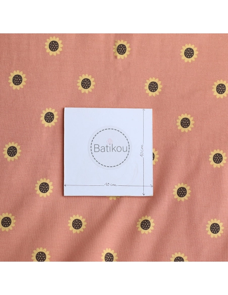 Jersey coton à motif fleurs de tournesol fond tomette clair