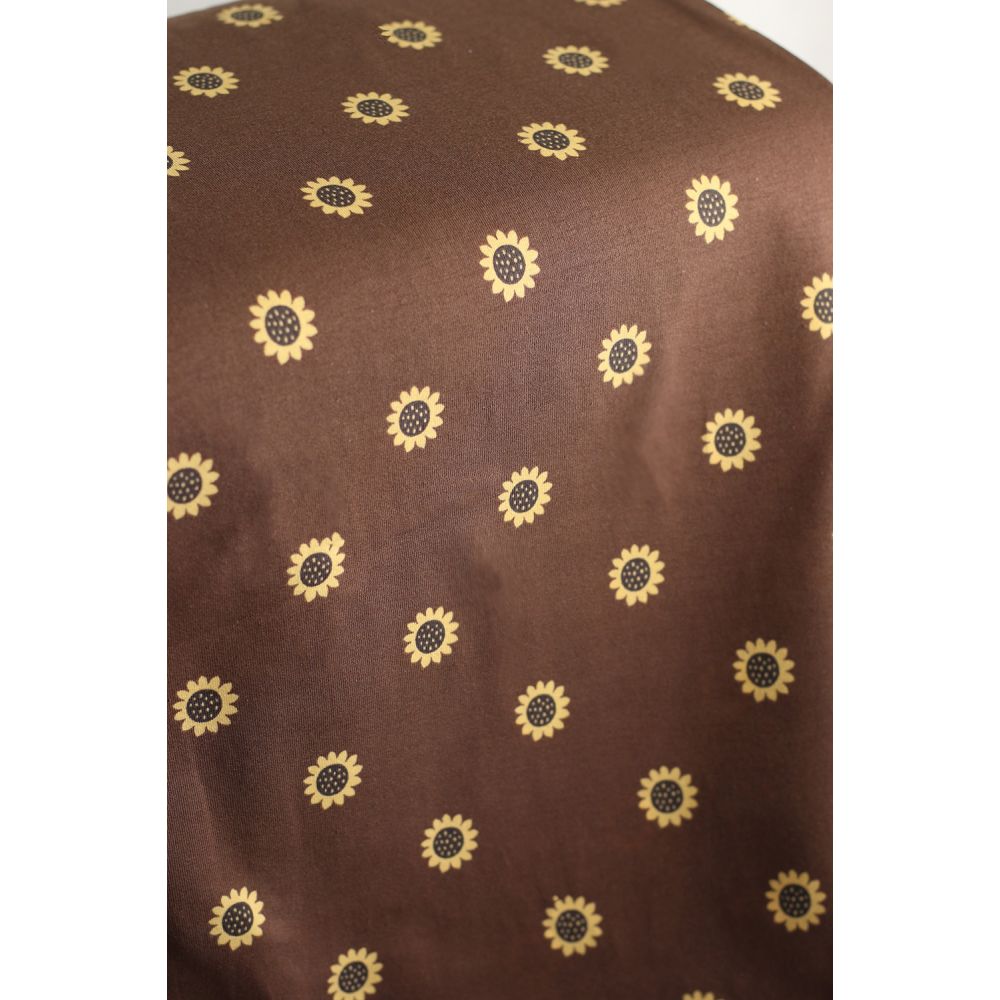 Jersey coton à motif fleurs de tournesol fond chocolat