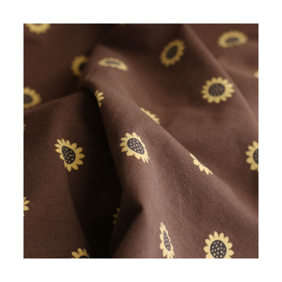 Jersey coton à motif fleurs de tournesol fond chocolat