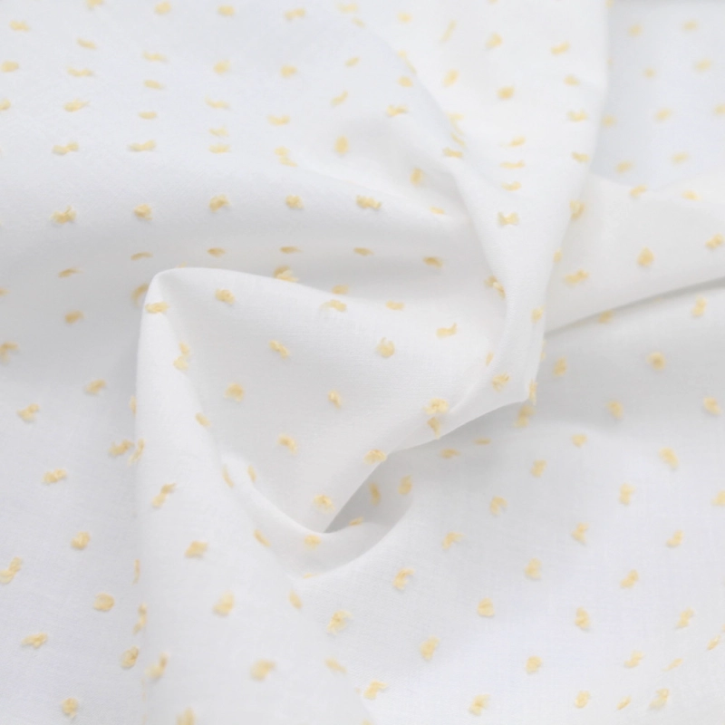 Plumetis de coton bicolore blanc et jaune clair