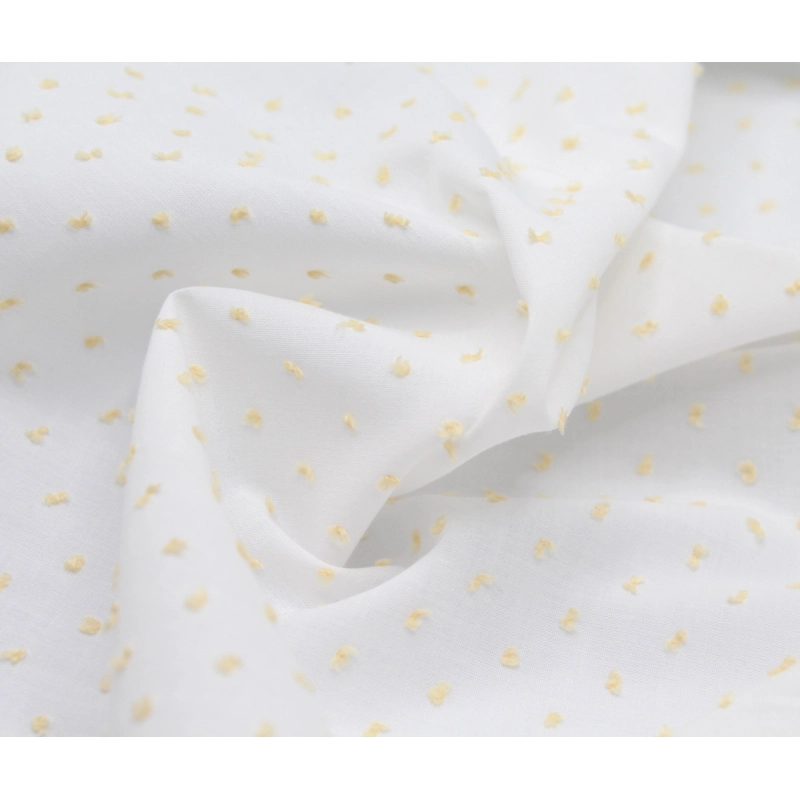 Plumetis de coton bicolore blanc et jaune clair