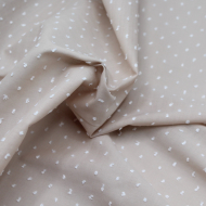 Plumetis de coton bicolore sable et blanc