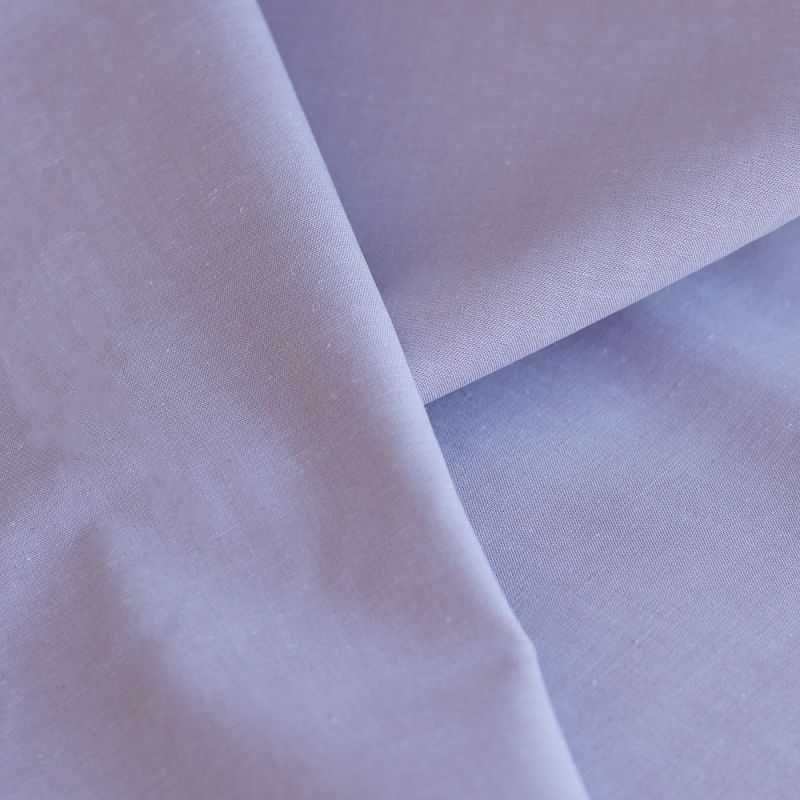 Popeline coton uni chiné effet chambray parme