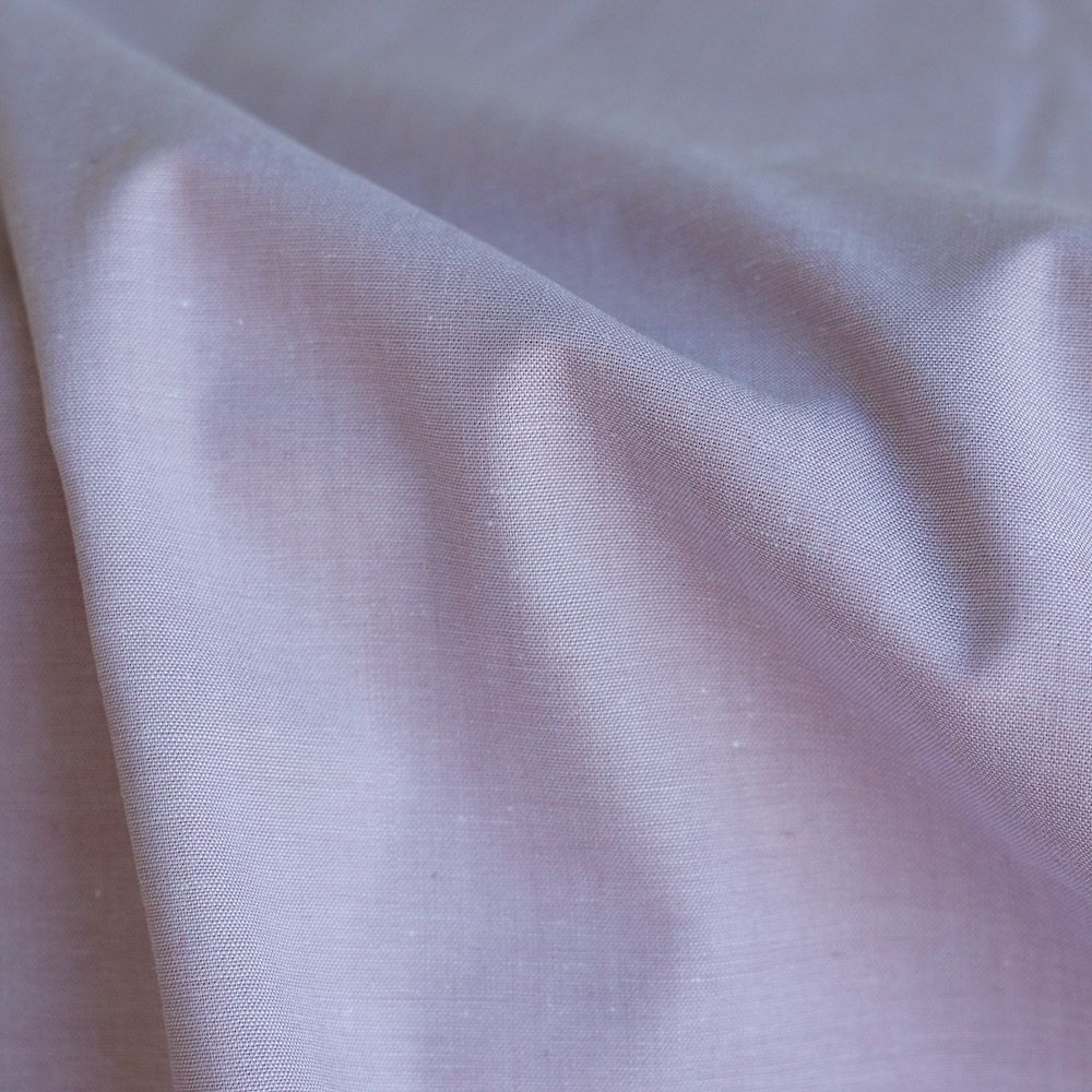 Popeline coton uni chiné effet chambray parme