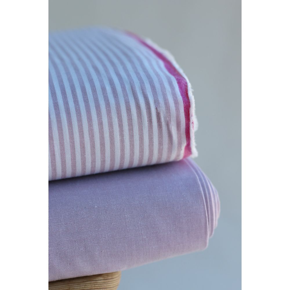 Popeline coton uni chiné effet chambray parme