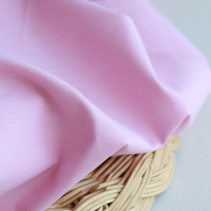 Popeline coton uni chiné effet chambray rose frais