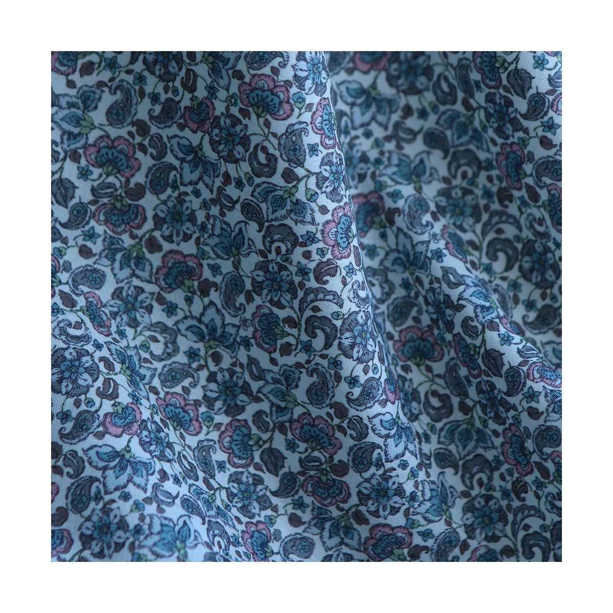 Alya - Batiste de coton SILKYNE à imprimé fleuri bleu Alya - Batiste de coton SILKYNE à imprimé fleuri bleu