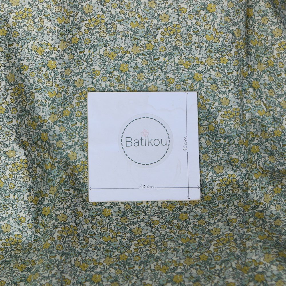 Eleanore - Popeline douce coton organique fond ivoire fleuri vert et jaune