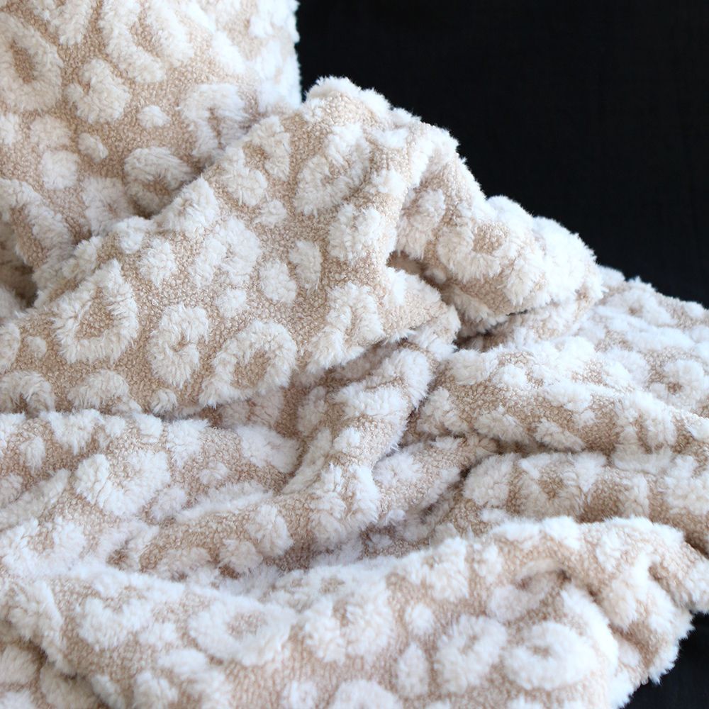 Teddy / moumoute bouclé fond crème relieg Graou écru