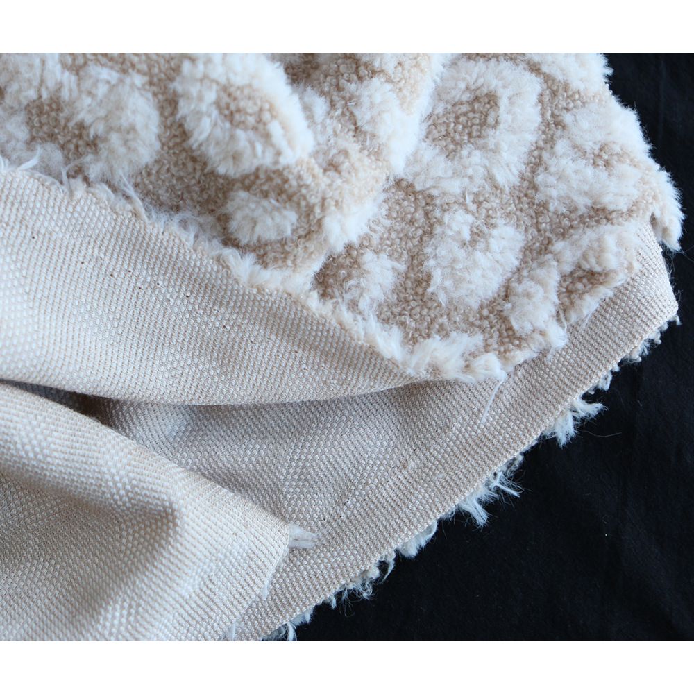 Teddy / moumoute bouclé fond crème relieg Graou écru