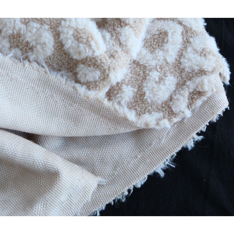 Teddy / moumoute bouclé fond crème relieg Graou écru