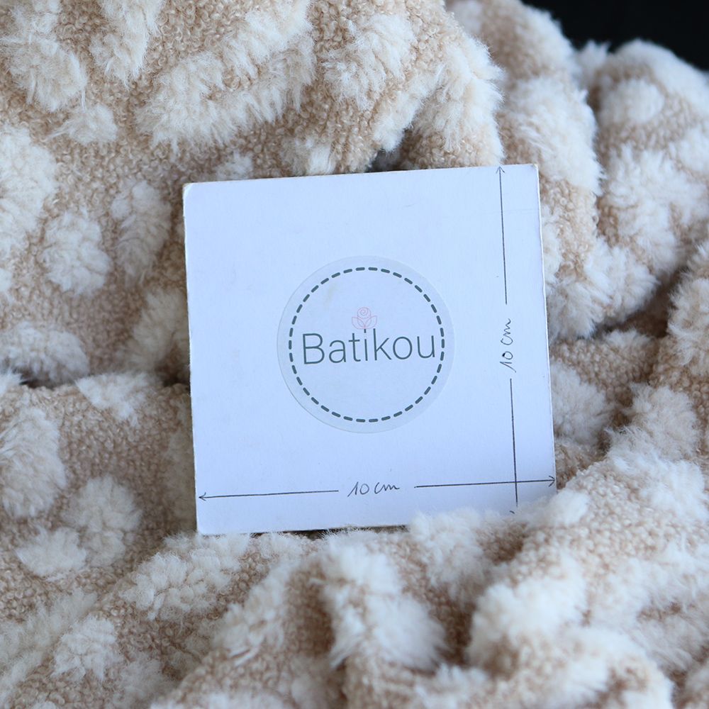 Teddy / moumoute bouclé fond crème relieg Graou écru