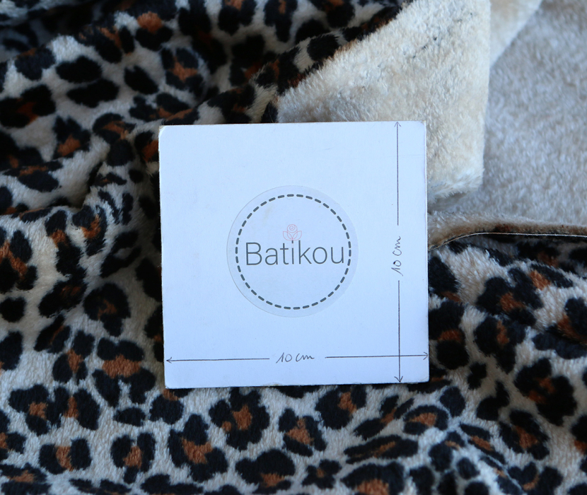 Graou - Polaire double face motif leopard sur fond beige