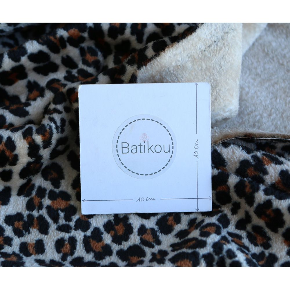 Graou - Polaire double face motif leopard sur fond beige