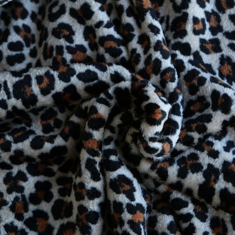 Graou - Polaire double face motif leopard sur fond beige