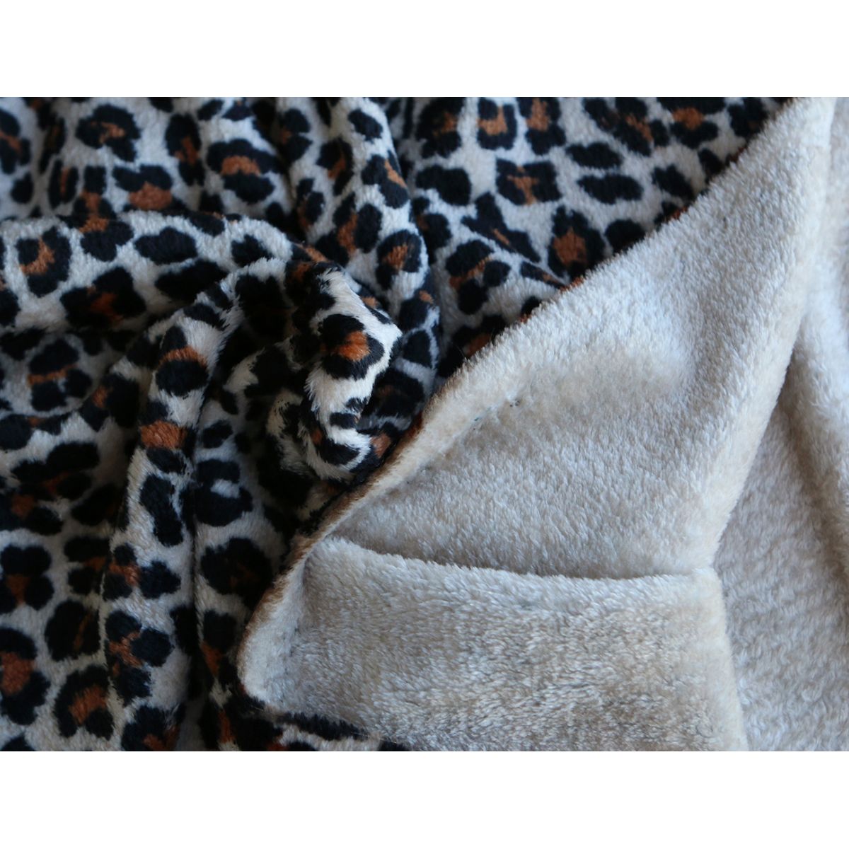 Graou - Polaire double face motif leopard sur fond beige Graou - Polaire double face motif leopard sur fond beige