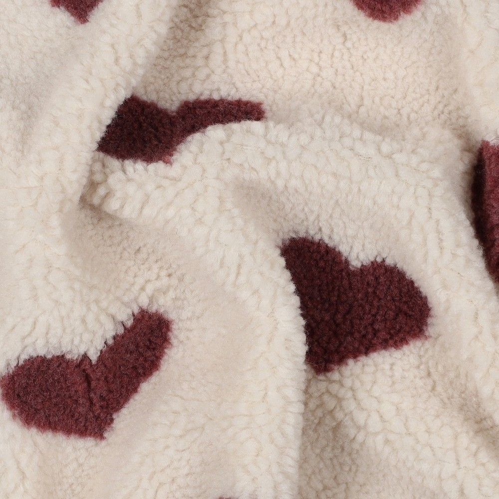 Teddy / moumoute bouclé fond crème motif coeurs bordeaux
