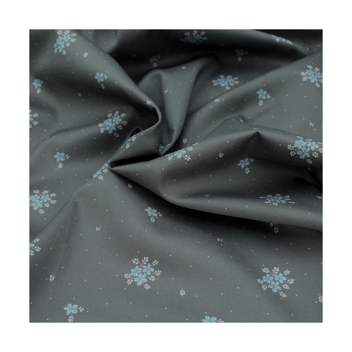 Coton satiné motif Beth exclusif Batikou fond pois gris étain x1m