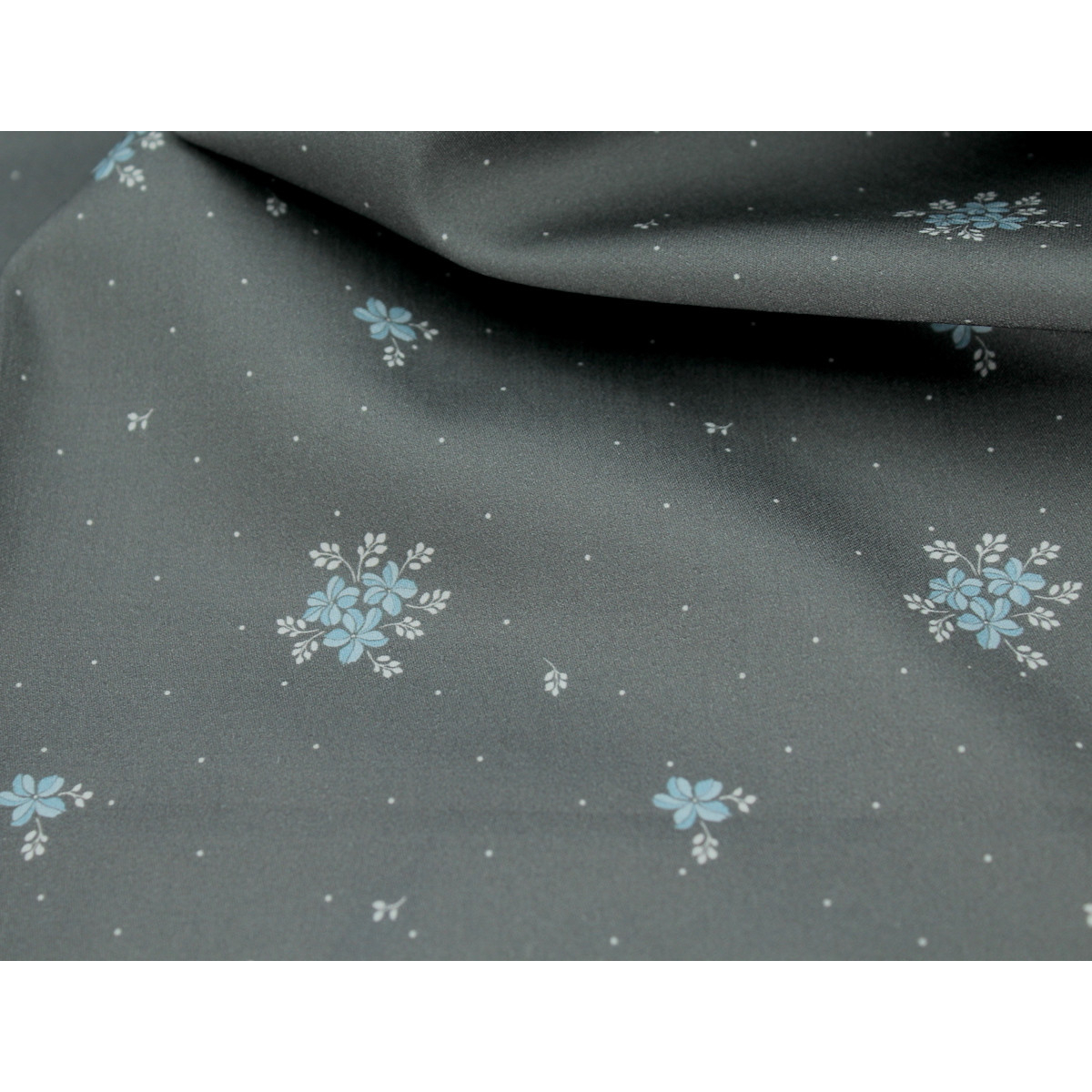 Coton satiné motif Beth exclusif Batikou fond pois gris étain x1m