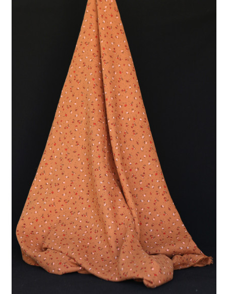 Double gaze de coton motif fleuri fond pain d'épices