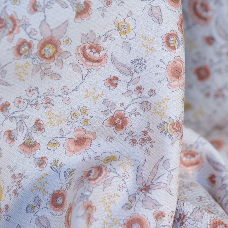 April - Tissu coton piqué léger texturé fleuri rose