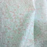 Evie - Batiste de coton SILKYNE à imprimé petit fleuri vert doux