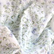 Romy - Popeline douce coton organique fond lait imprimé fleuri bleu