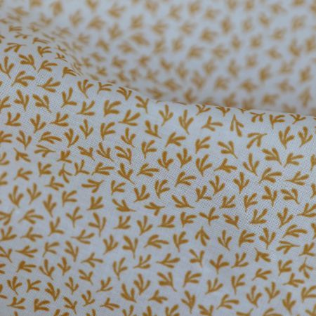 Cleo - Batiste de coton douce petit motif moutarde Cleo - Batiste de coton douce petit motif moutarde