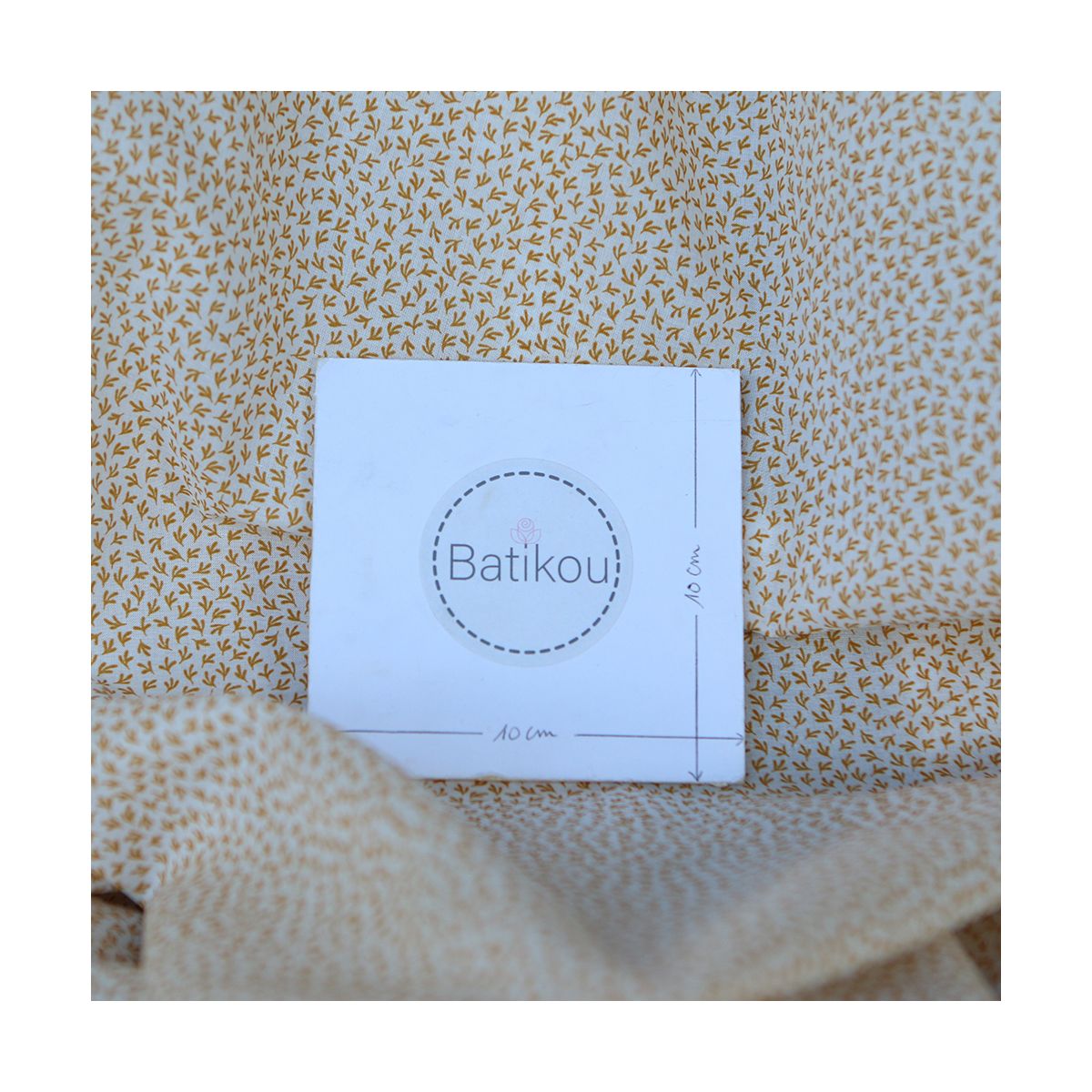 Cleo - Batiste de coton douce petit motif moutarde Cleo - Batiste de coton douce petit motif moutarde