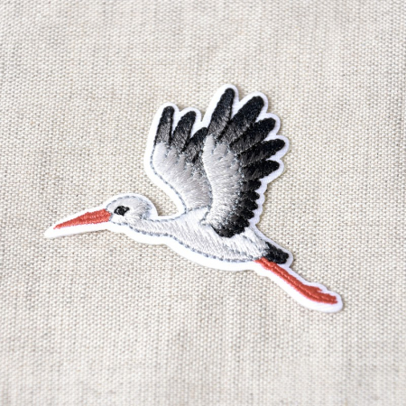 Ecusson cigogne thermocollant sans couture 55mm Ecusson cigogne thermocollant sans couture 55mm
