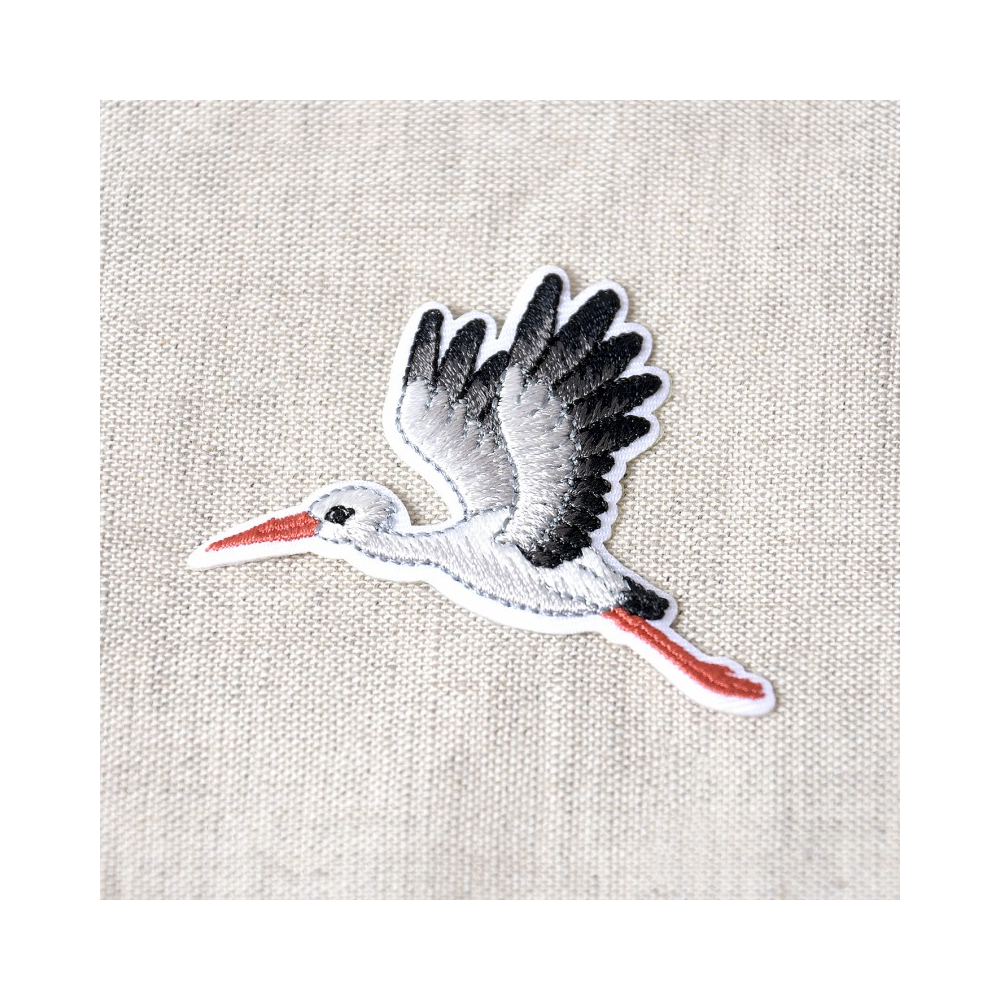 Ecusson cigogne thermocollant sans couture 55mm