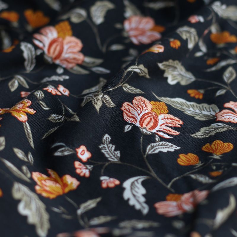 Jersey bambou coton à motif fleuri automne fond noir