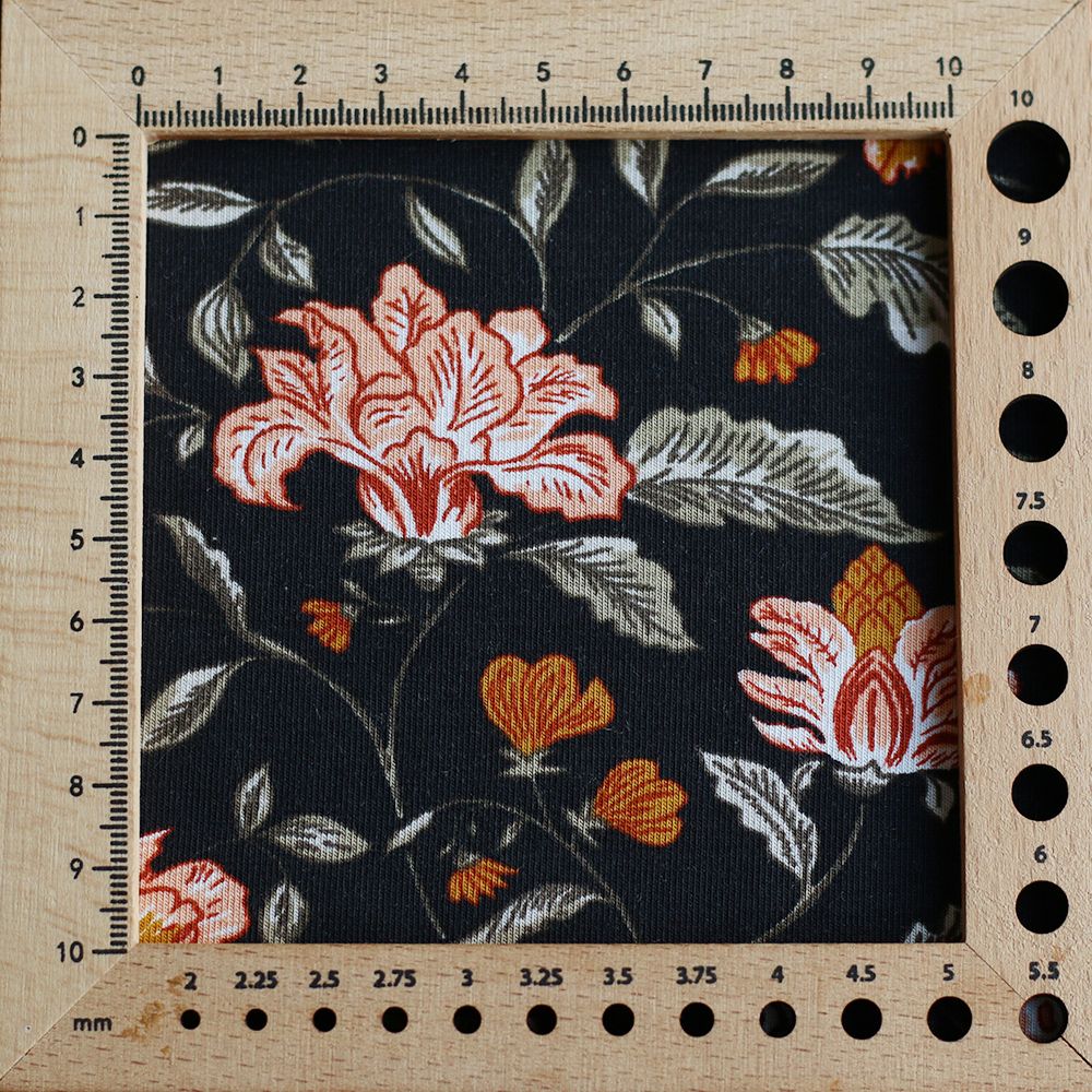 Jersey bambou coton à motif fleuri automne fond noir