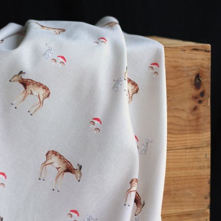 Bambi - Popeline de coton fond beige motif biche, lapin et champignons