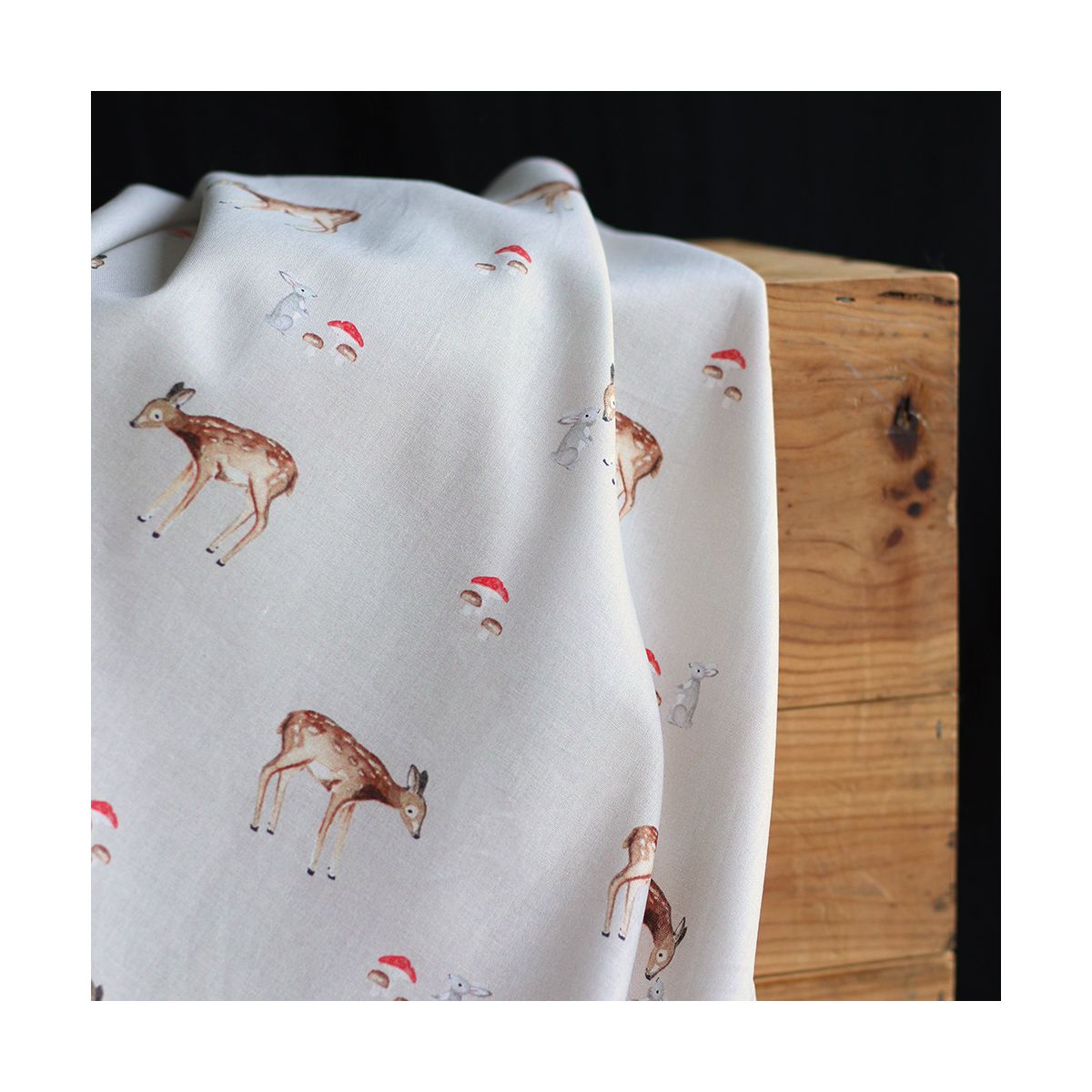 Bambi - Popeline de coton fond beige motif biche, lapin et champignons