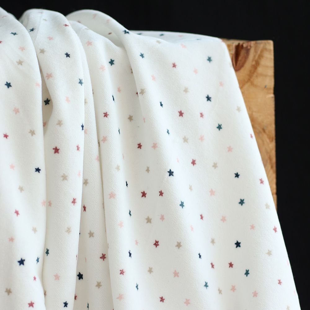 Stars - Velours de coton Nicky fond blanc lait motif étoiles