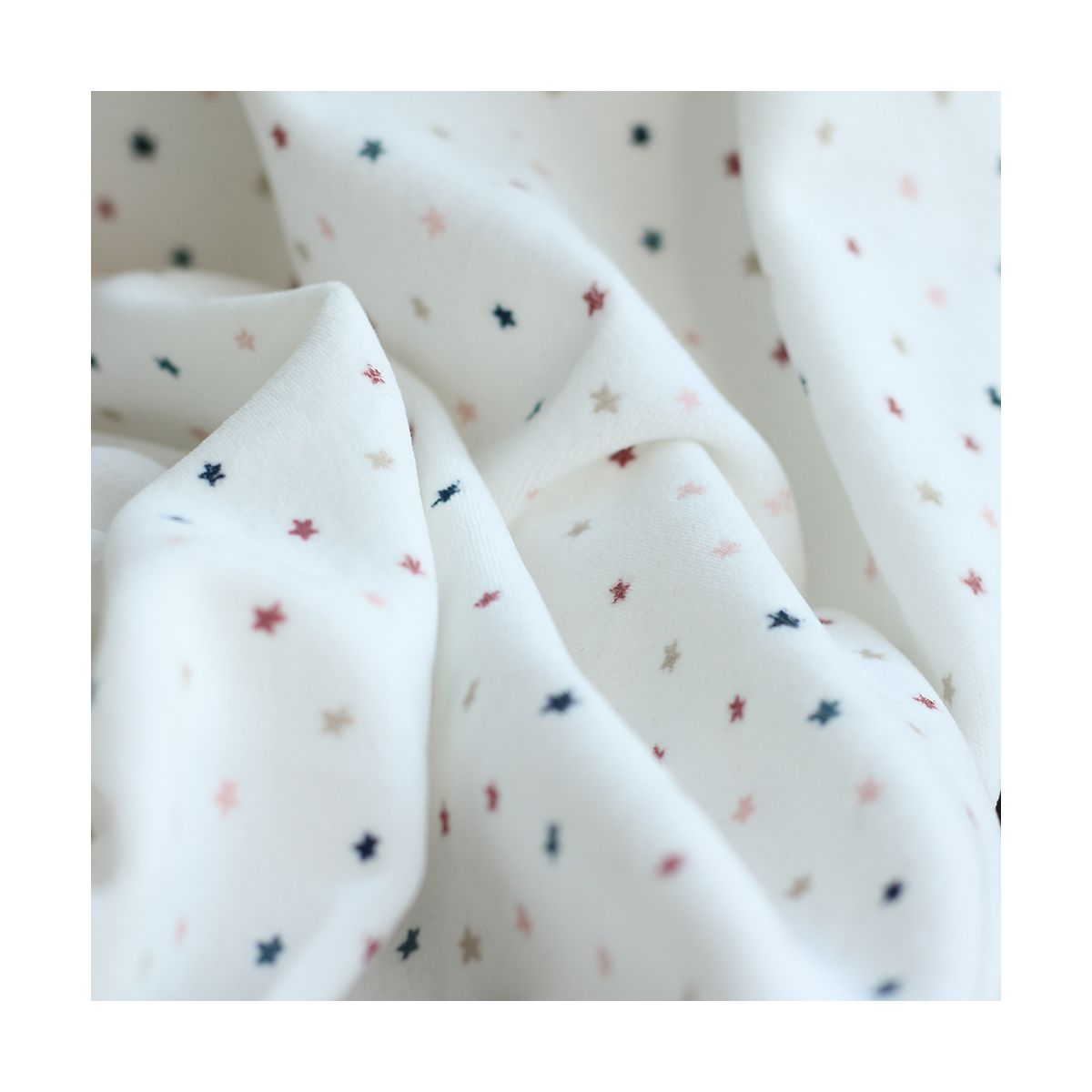Stars - Velours de coton Nicky fond blanc lait motif étoiles
