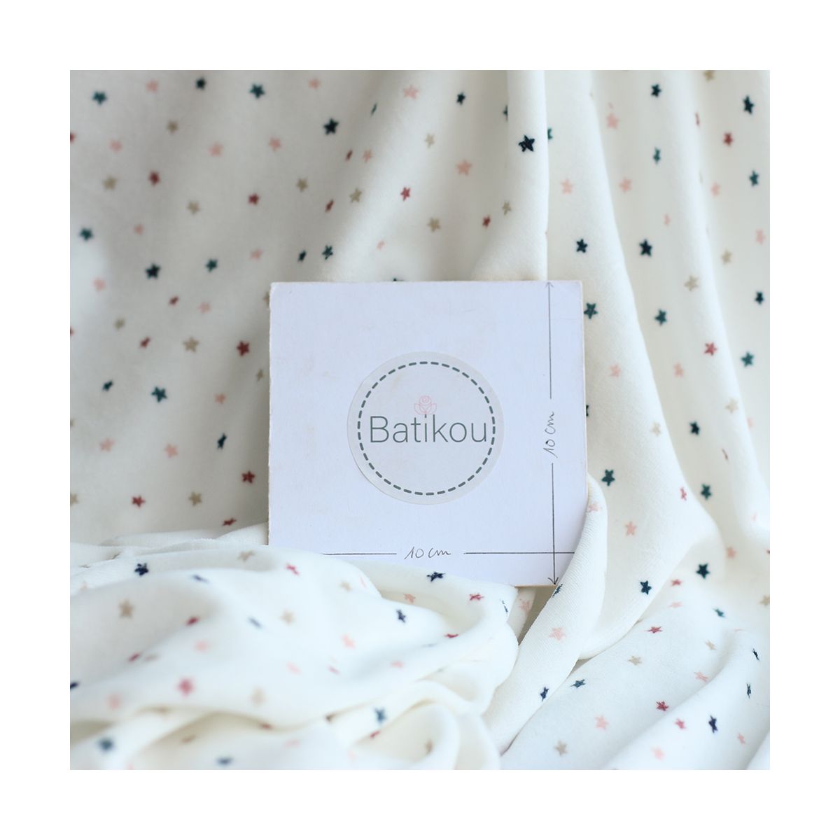 Stars - Velours de coton Nicky fond blanc lait motif étoiles