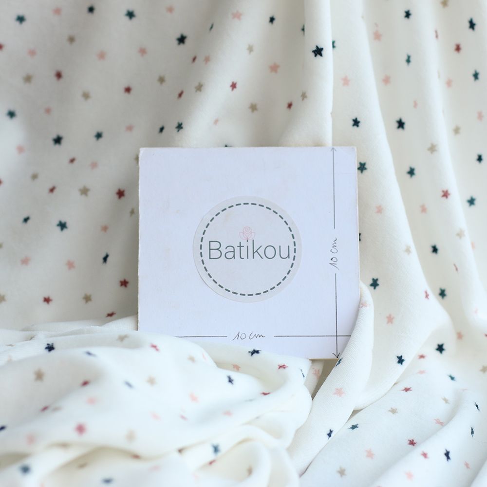 Stars - Velours de coton Nicky fond blanc lait motif étoiles
