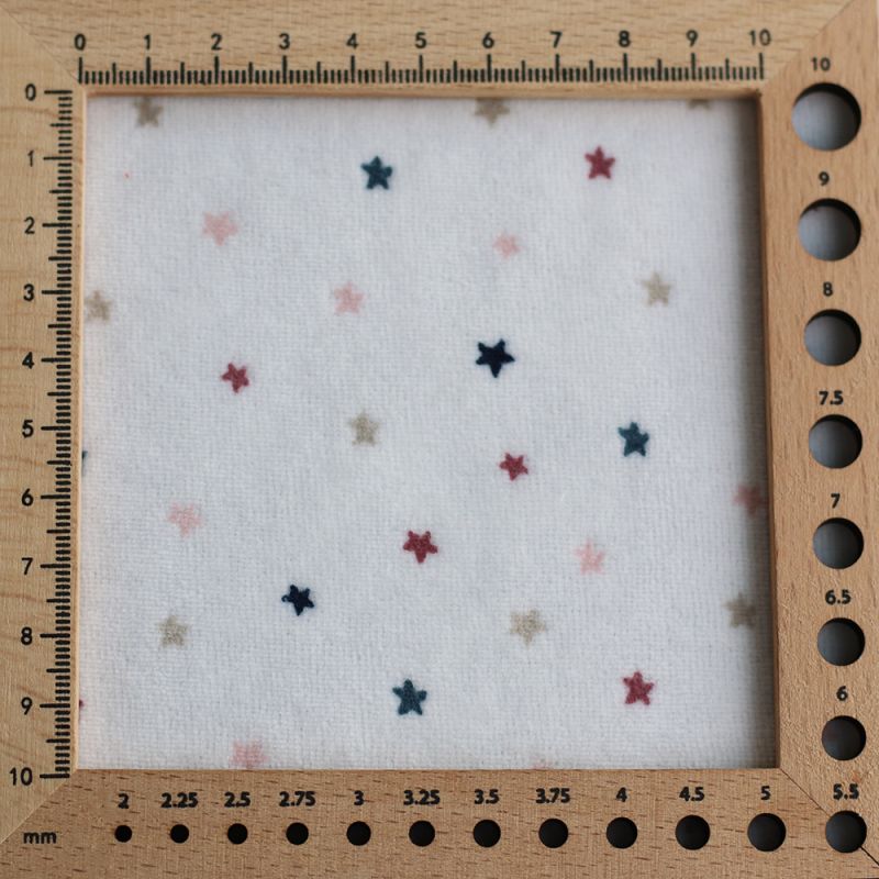 Stars - Velours de coton Nicky fond blanc lait motif étoiles