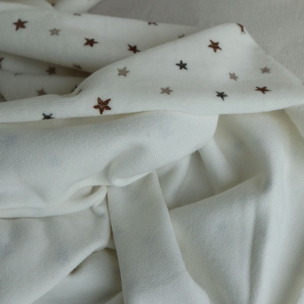 Stars - Velours de coton Nicky fond blanc lait motif étoiles marron