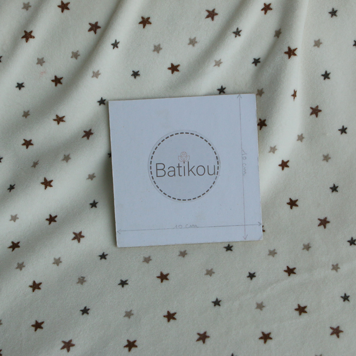 Stars - Velours de coton Nicky fond blanc lait motif étoiles marron