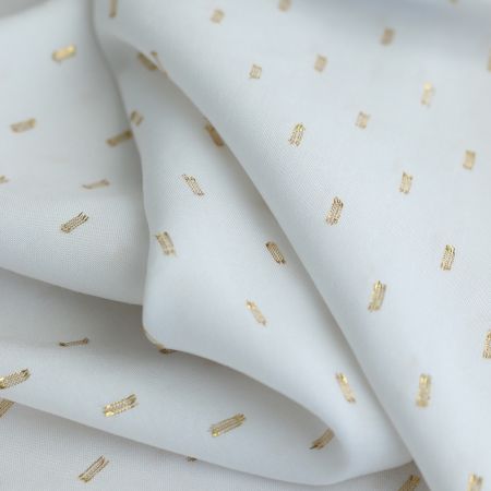 Viscose uni plumetis doré coloris écru