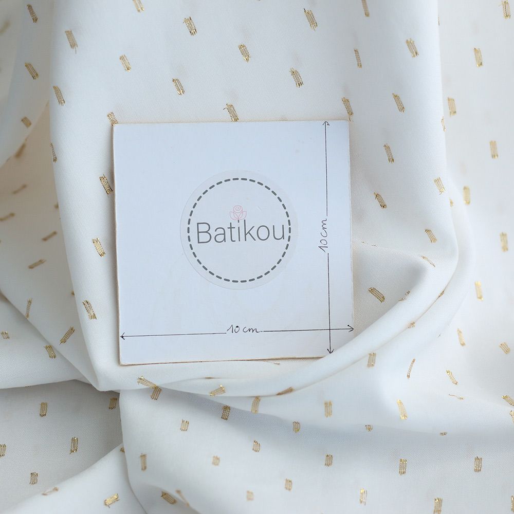 Viscose uni plumetis doré coloris écru