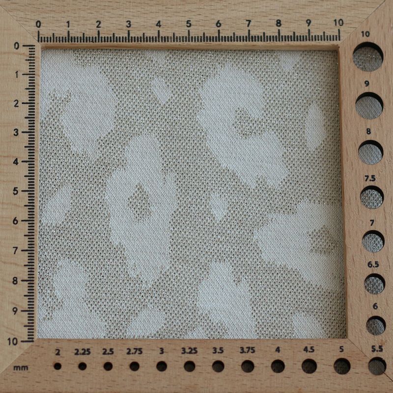 Jersey jacquard à motif graou ton sur ton écru doré