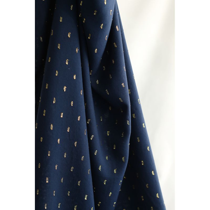 Viscose uni plumetis doré coloris bleu marine