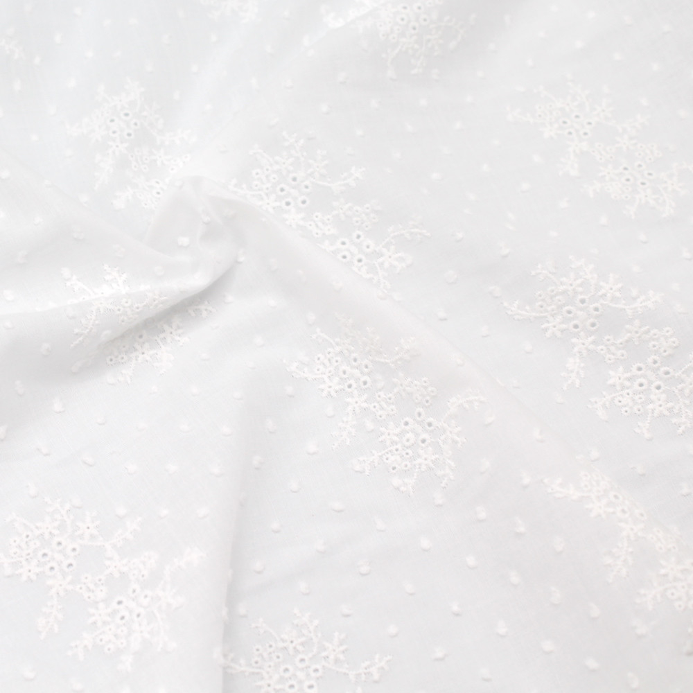 Broderie anglaise plumetis de coton coloris ivoire