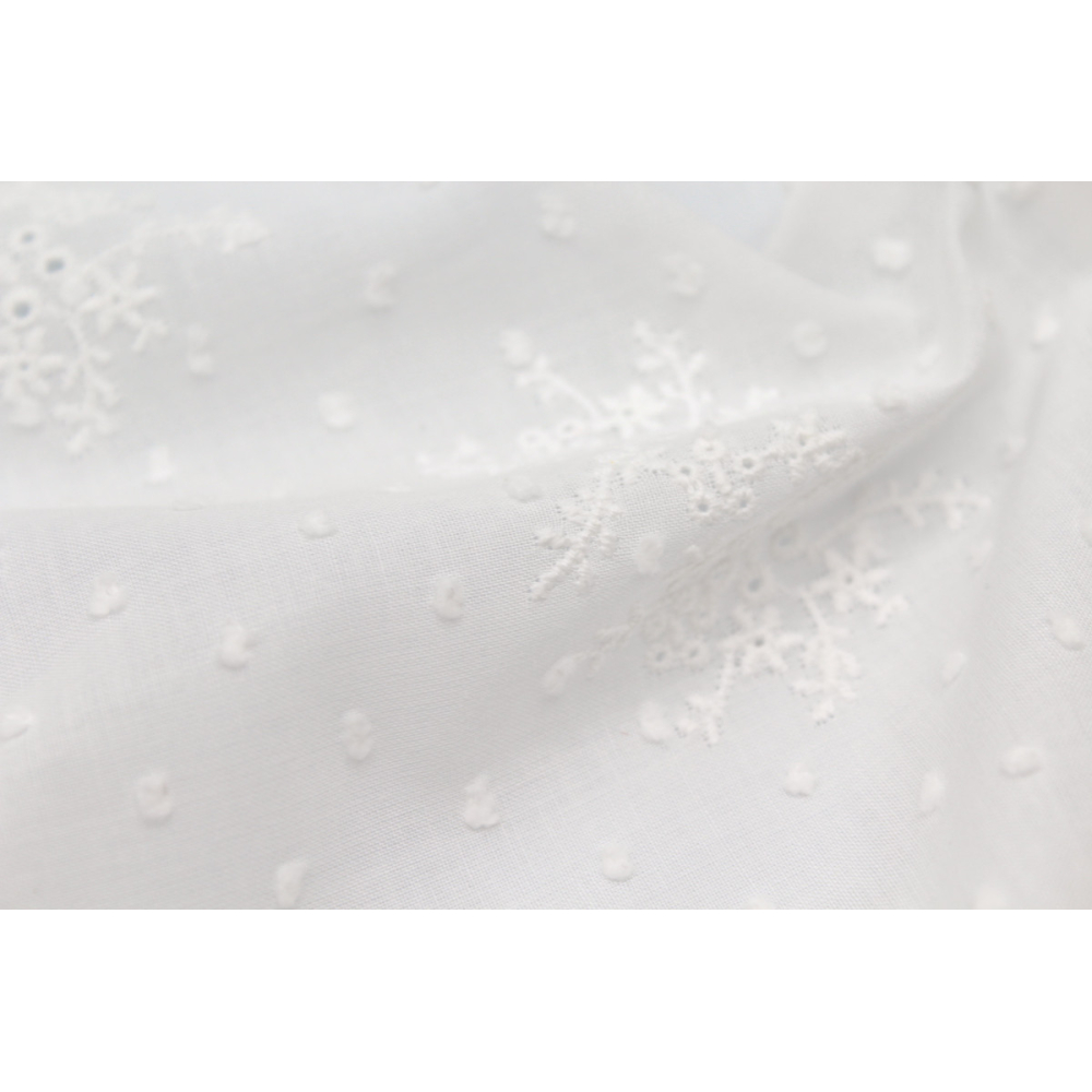 Broderie anglaise plumetis de coton coloris ivoire