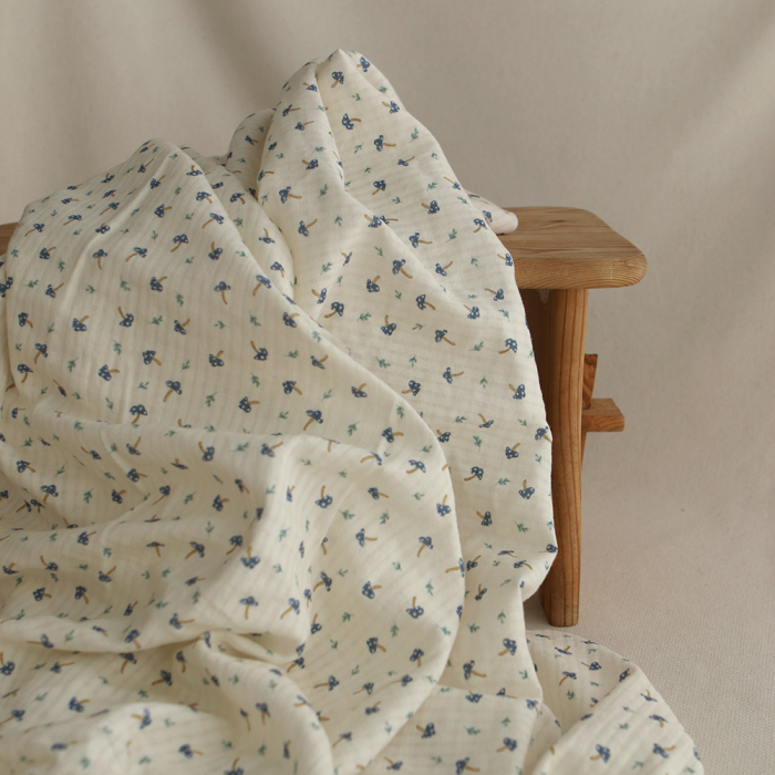 Mario - Seersucker / Coton gaufré doux fond écru champignons bleus